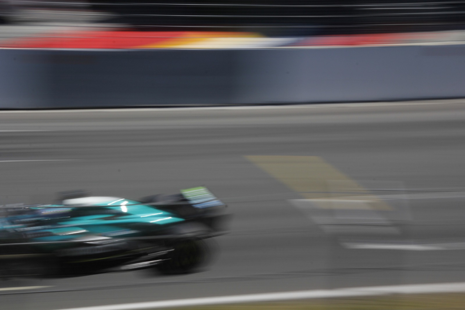 Race car driving past at speed